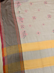 Close-up of cream aane kasuti cotton saree with motif detail